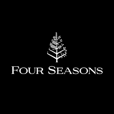 A black and white logo of four seasons.