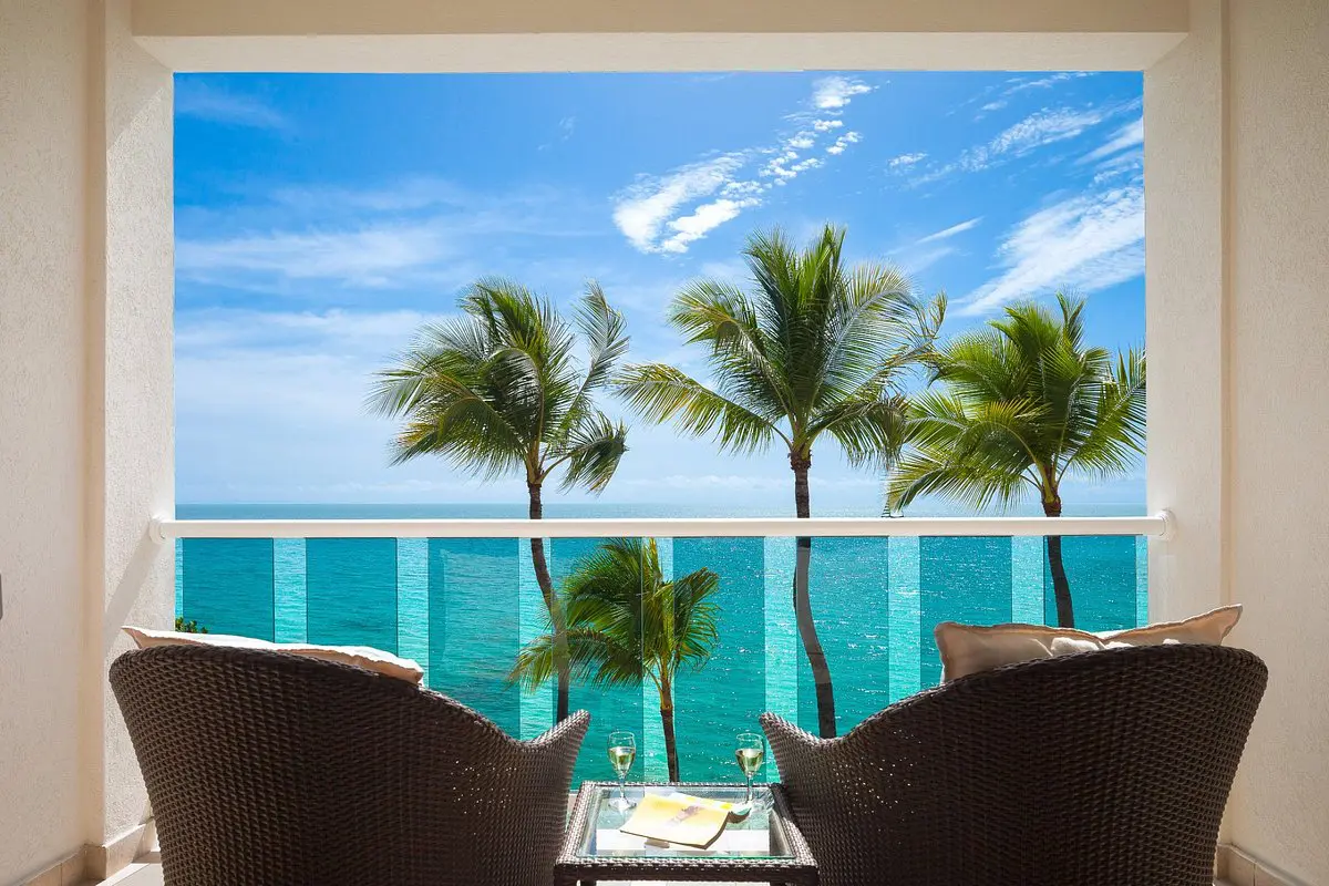 A view of the ocean from an outdoor patio.