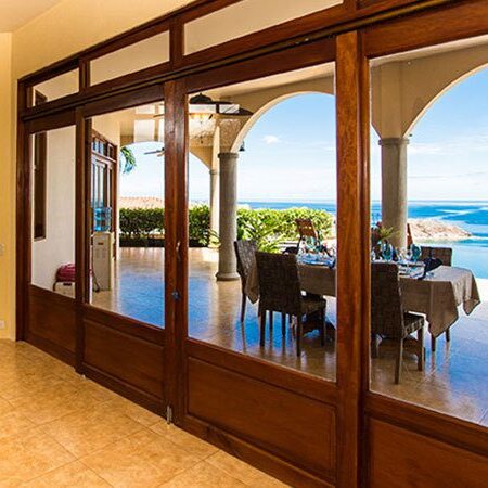 A large open room with an ocean view.